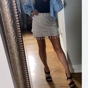White linen skirt with fringe pompom